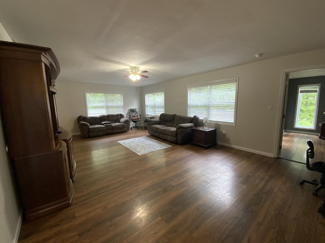 251 A Duncan Rd, Strunk, KY 42649 - living room with healthy amount of natural light, a ceiling fan, and dark wood-type flooring
