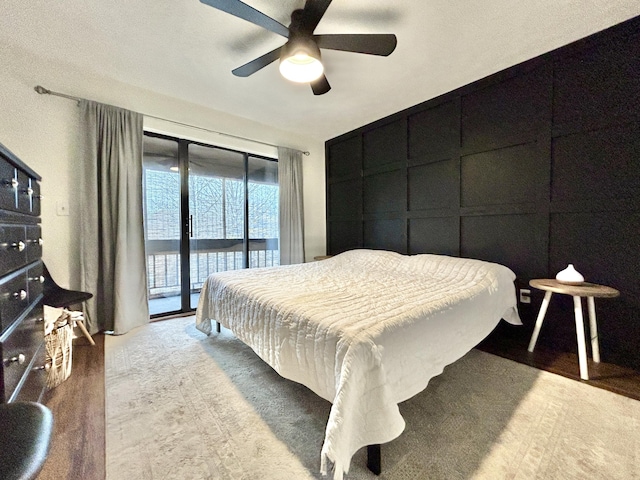 bedroom featuring access to outside and ceiling fan