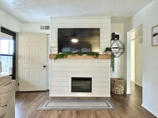 living room featuring dark hardwood / wood-style floors