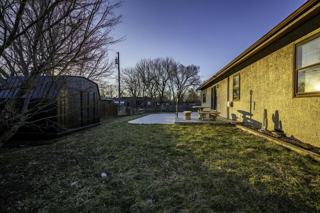 view of yard featuring a patio and fence