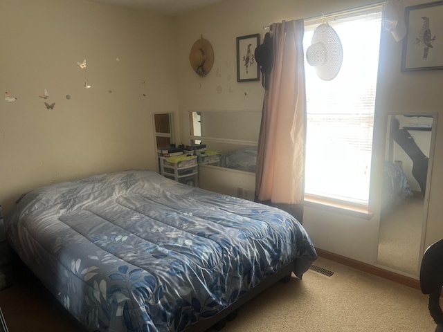 bedroom featuring carpet floors