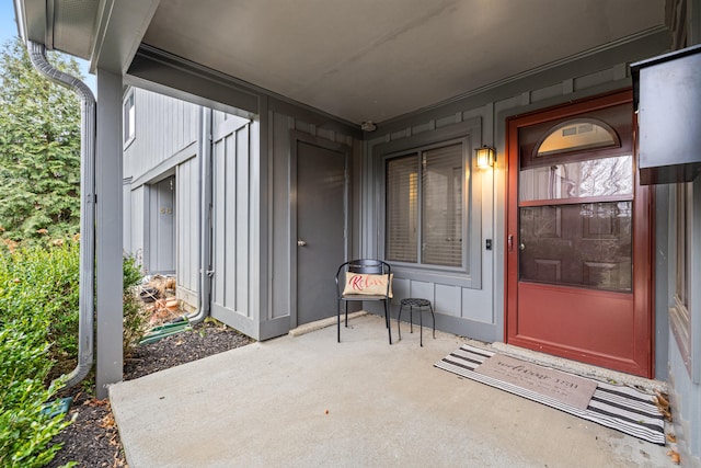 entrance to property with a patio area