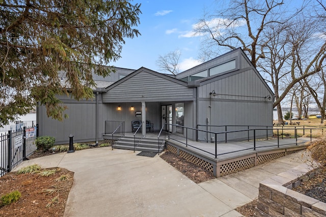 view of front of house with a wooden deck