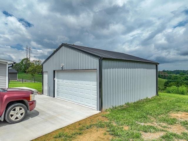 garage with a lawn