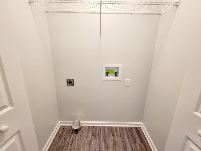 clothes washing area with hookup for a washing machine, hardwood / wood-style floors, and hookup for an electric dryer