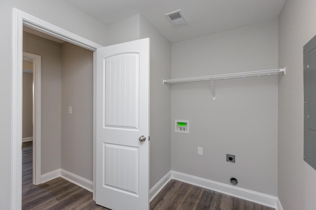 washroom with hookup for a washing machine, dark hardwood / wood-style floors, and hookup for an electric dryer