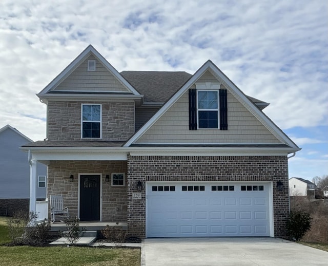 craftsman inspired home with a garage and a porch