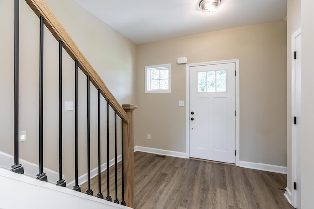 foyer entrance featuring hardwood / wood-style floors