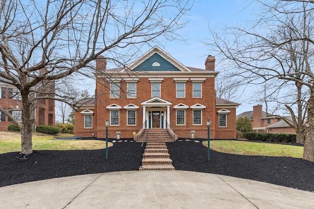 view of front of home with a front yard