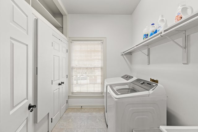 laundry room with washer and dryer