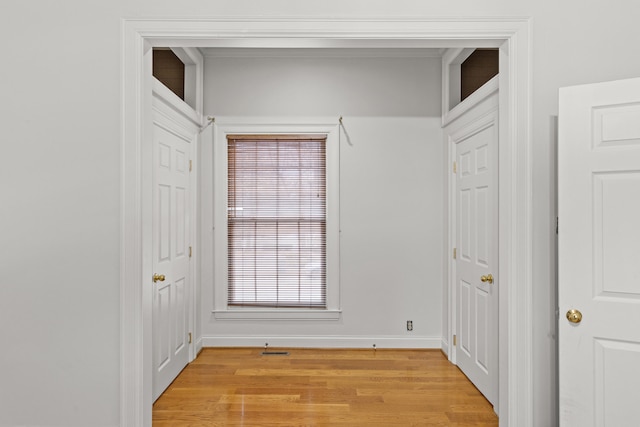 hallway featuring light wood-type flooring