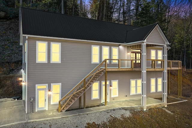 780 Lake Rd, London, KY 40741 - rear view of property with stairway, a patio area, and metal roof