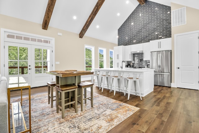 780 Lake Rd, London, KY 40741 - dining space with high vaulted ceiling, french doors, beamed ceiling, dark wood-style floors, and recessed lighting