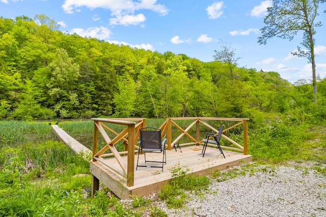 780 Lake Rd, London, KY 40741 - surrounding community with a forest view and a deck