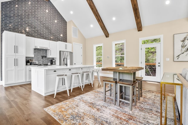 780 Lake Rd, London, KY 40741 - dining area with high vaulted ceiling, wood finished floors, beam ceiling, and recessed lighting