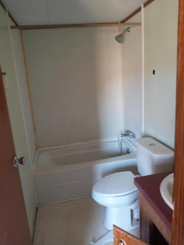 full bathroom with toilet, vanity, and washtub / shower combination