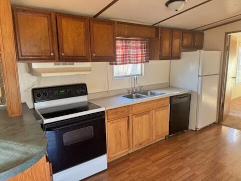 222 Ore Mines Rd, Owingsville, KY 40360 - kitchen featuring a sink, black dishwasher, electric stove, exhaust hood, and brown cabinets