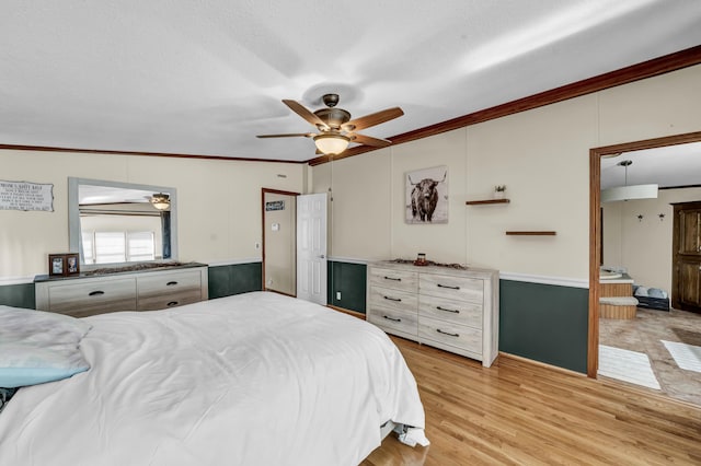 579 Fraley Rd, Salt Lick, KY 40371 - bedroom featuring light wood finished floors, a ceiling fan, and crown molding