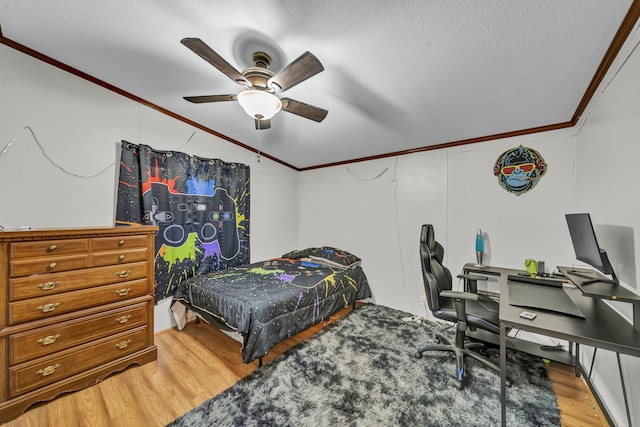579 Fraley Rd, Salt Lick, KY 40371 - bedroom with a ceiling fan, ornamental molding, a textured ceiling, and light wood-type flooring