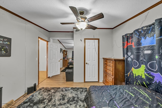 579 Fraley Rd, Salt Lick, KY 40371 - bedroom with wood finished floors, a textured ceiling, and crown molding