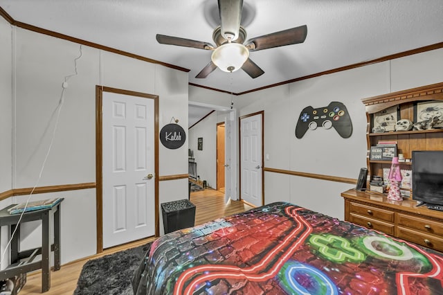 579 Fraley Rd, Salt Lick, KY 40371 - bedroom featuring wood finished floors, crown molding, and ceiling fan