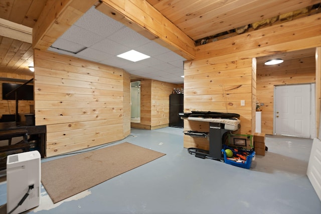 interior space featuring wooden walls