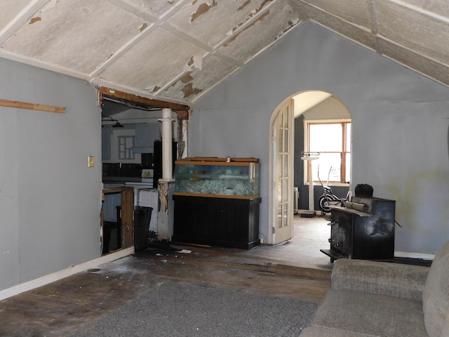 living room featuring vaulted ceiling