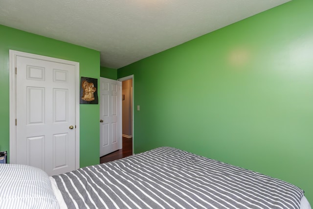 bedroom with a textured ceiling