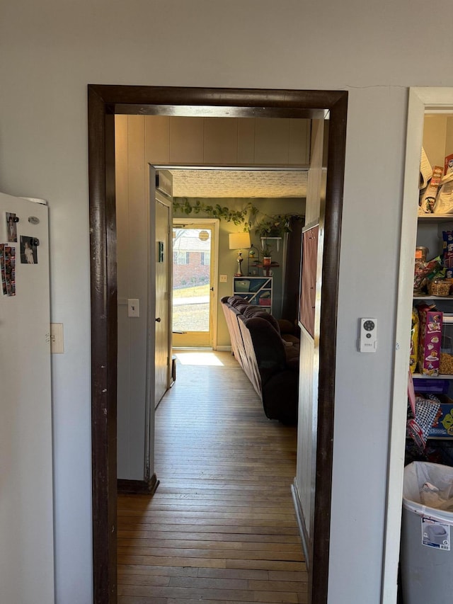 hall featuring hardwood / wood-style flooring