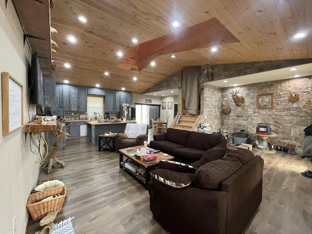 living room with wood ceiling, wood-type flooring, and vaulted ceiling