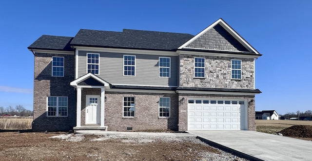 view of front of home featuring a garage