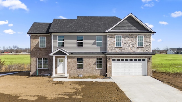 view of front of house featuring brick siding, roof with shingles, an attached garage, a front yard, and driveway