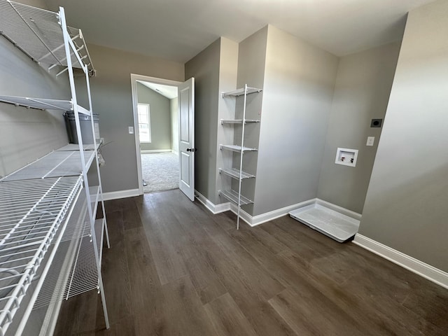 clothes washing area featuring washer hookup, dark hardwood / wood-style flooring, and electric dryer hookup