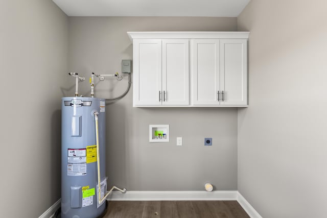 laundry room featuring cabinet space, baseboards, hookup for an electric dryer, water heater, and washer hookup