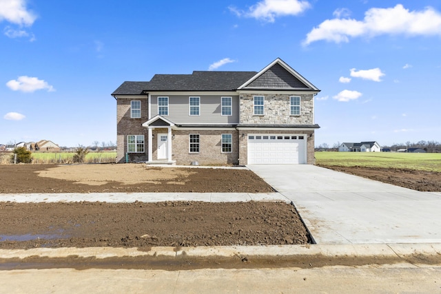 view of front of house with driveway, stone siding, an attached garage, and brick siding