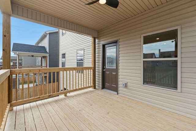 wooden deck with ceiling fan