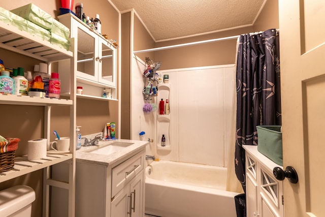 full bathroom featuring crown molding, vanity, shower / bath combination with curtain, a textured ceiling, and toilet