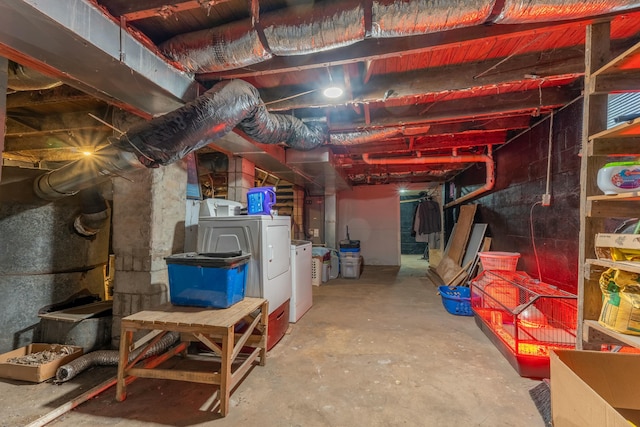 basement featuring washer and clothes dryer