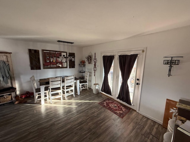 dining room featuring dark wood-type flooring