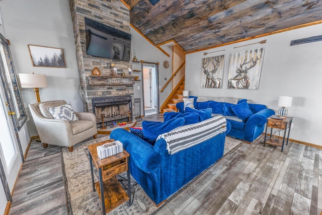 living room with wood-type flooring, vaulted ceiling, wooden ceiling, and a fireplace