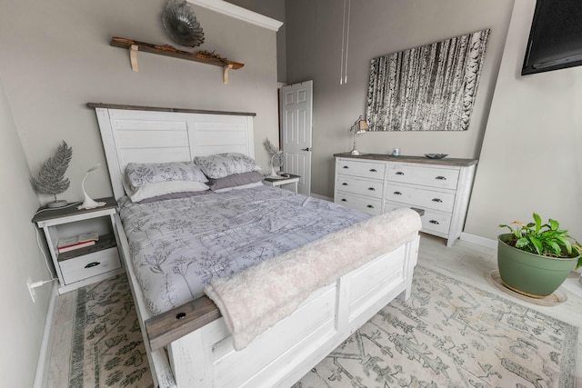 bedroom featuring light wood-type flooring