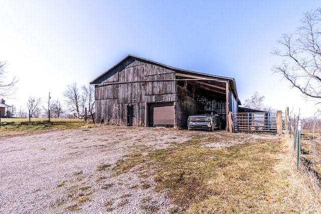 228 Jolly Ridge Rd, Richmond, KY 40475 - view of barn featuring a carport and fence