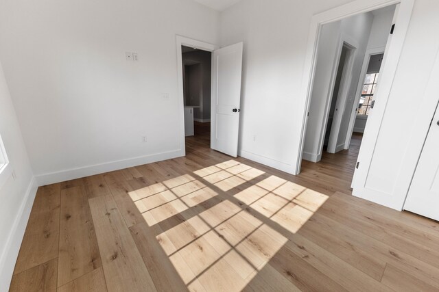 unfurnished dining area featuring light hardwood / wood-style floors