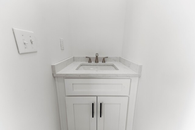 bathroom featuring wood-type flooring and toilet