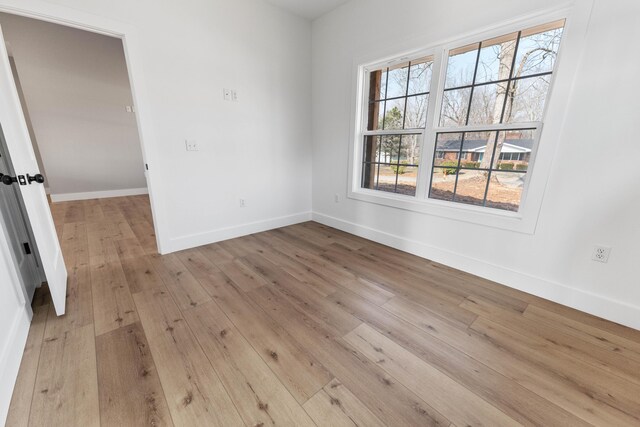 unfurnished bedroom featuring light hardwood / wood-style floors