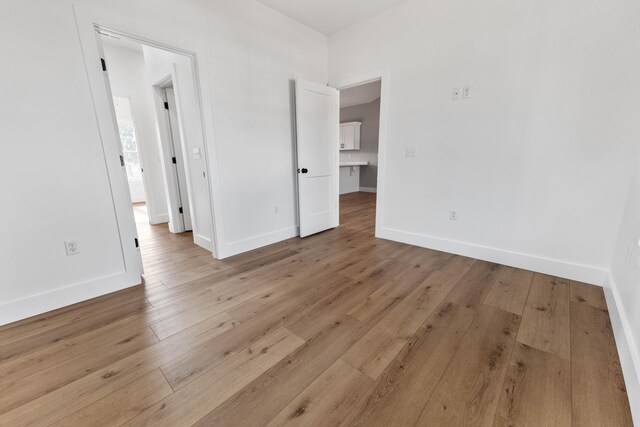 empty room featuring light hardwood / wood-style floors