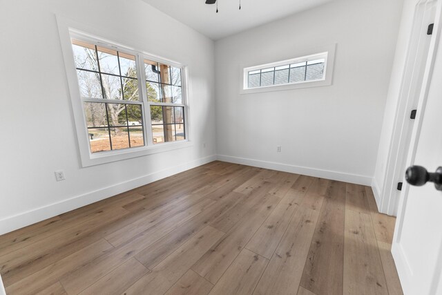 bathroom with vanity, wood-type flooring, toilet, and walk in shower