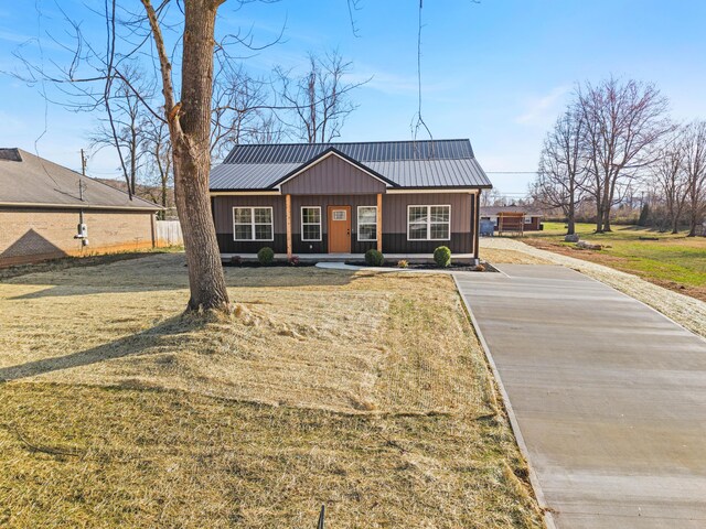 view of side of home featuring a porch