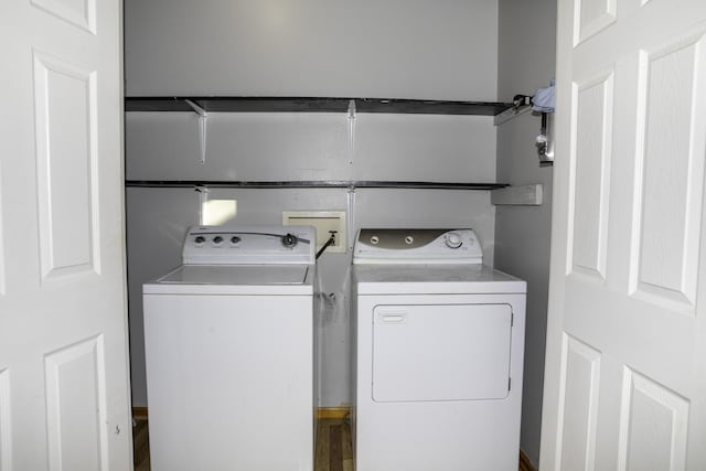 washroom with washer and clothes dryer