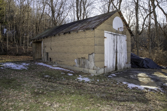 view of outbuilding featuring a garage